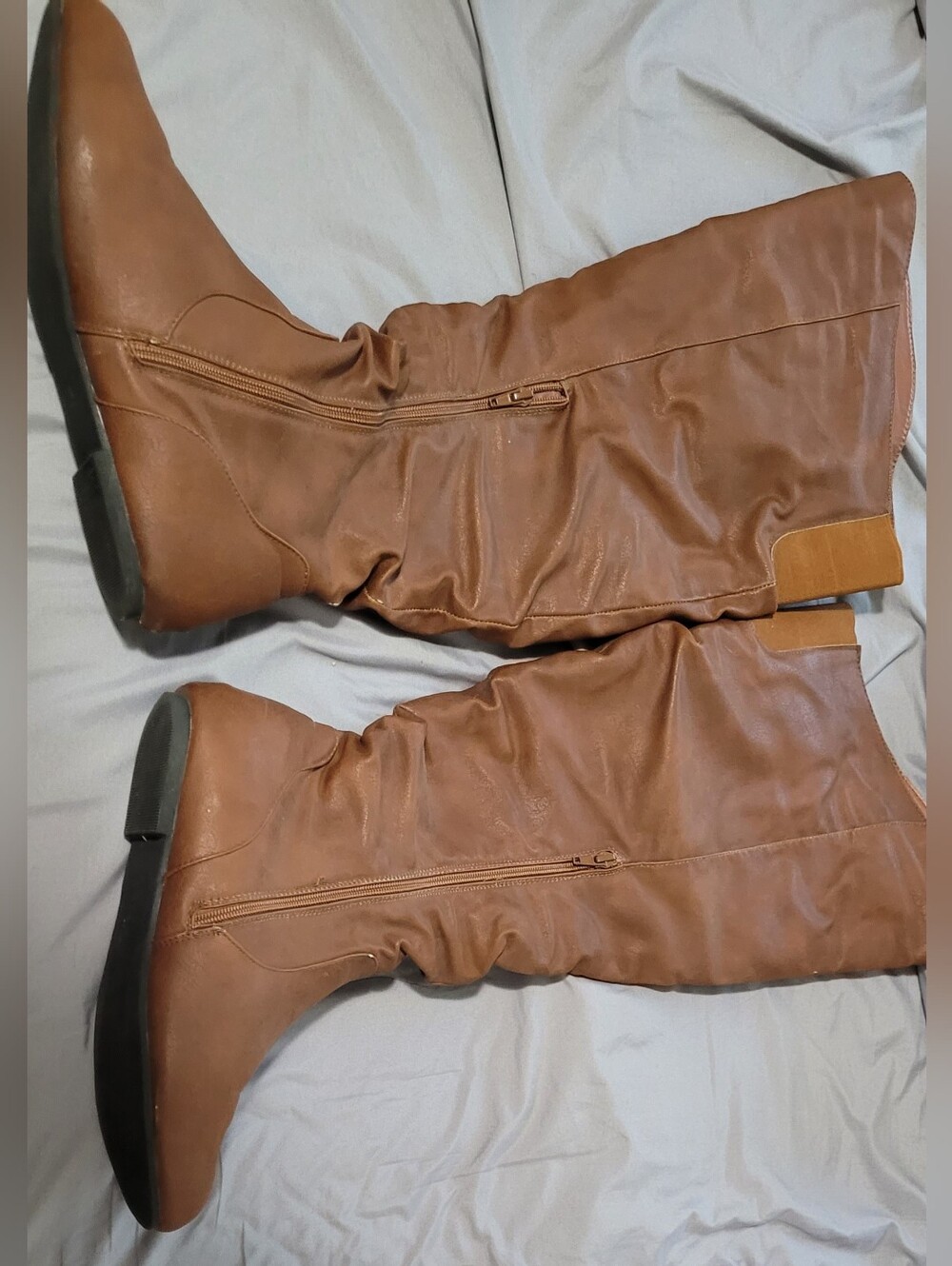 Knee high zippered boots. Slouchy